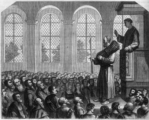 Verfolgungen von Protestanten in England im 16. Jahrhundert: öffentliche Buße von James Bainham (Baynham) in Saint Paul. Wegen Ketzerei angeklagt, wurde er verurteilt, während einer gegen ihn gehaltenen Predigt vor der Kanzel zu stehen, ein Reisigbündel au
