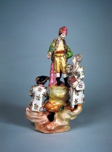 Statuette von vier Personen auf einer Felsenformation (Faience)