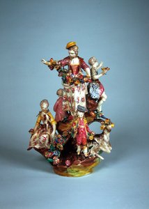 Statuette von Frauen und Kindern auf einer Felsenformation (Faience)