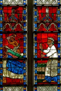 Fenster w15, das eine Szene aus einer Legende von St. Nikolaus darstellt: Das Wunder der 3 Jungen: Ein Metzger tötet drei Jungen
