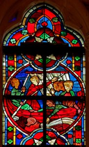 Fenster w209 zeigt eine Szene aus einer Legende des Heiligen Nikolaus: ein Teufel gibt Reisenden eine Flüssigkeit, aber die Flasche geht über Bord verloren von French School