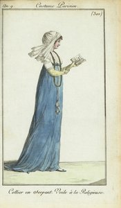 Frau im Nonnen-Schleier liest eine Modezeitschrift