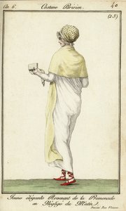 Elegante junge Frau beim Spaziergang auf der Rue Vivienne