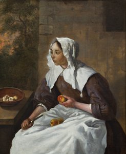Mädchen schält Äpfel