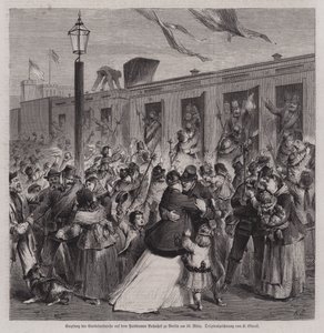 Soldaten der preußischen Gardelandwehr werden am Bahnhof Potsdam, Berlin, nach ihrer Rückkehr aus dem Deutsch-Französischen Krieg am 22. März 1871 begrüßt von German School