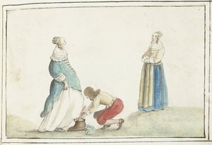 Herr bindet den Schuh einer Dame