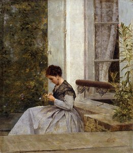 Eine Frau beim Häkeln