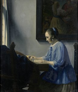 Musiklesende Frau