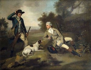 Ein Herr, der mit einer Waffe und einem Hund liegt, und sein Wildhüter steht in der Nähe