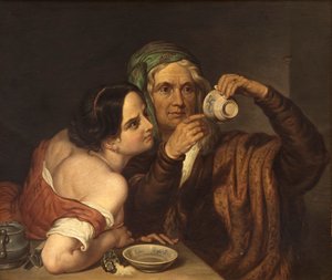 Zwei Frauen mit einer Tasse