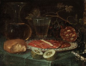 Stillleben mit Brotstück, Glaskaraffe, Weinglas, Platte mit Schinken und Schinkenwurst, Zitrone und Messer mit Perlmuttgriff von Italo flämischer Maler des 17. Jahrhunderts