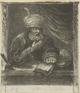 Mann mit Turban hinter einem Schreibtisch