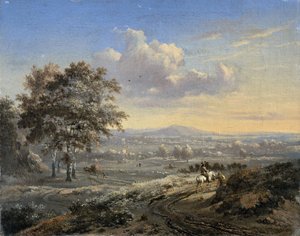Hügelige Landschaft mit einem Reiter auf einer Landstraße