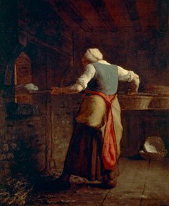 Frau beim Brotbacken