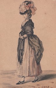 Eine Dame der Mode mit schwarzem Schal und schwarzen Schuhen