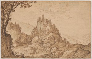 Ein Schloss auf einem Felsen in einer bergigen Landschaft