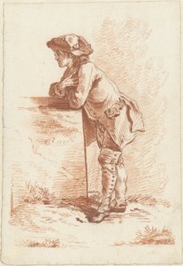 An einen Stein gelehnter junger Mann