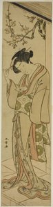 Frau auf einer Veranda, die im Begriff ist, einen Liebesbrief zu öffnen von Katsukawa Shunsho