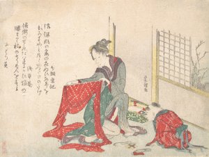 Frau faltet Stoff, spätes 18. - frühes 19. Jahrhundert von Katsushika Hokusai