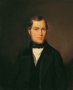 Junger Mann mit blauer Halsbinde