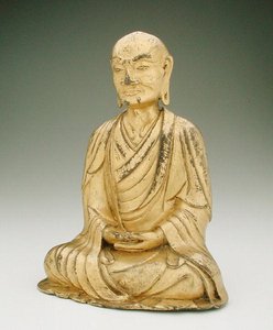 Figur eines sitzenden Lohan