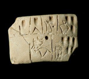 Mesopotamien: Tontafel mit Keilschrift aus dem Tempel von Eanna, gewidmet der Göttin Inanna in Uruk. 3200 v. Chr. Dim. 6,4x4,7 cm Bagdad, Irakisches Museum von Mesopotamian School