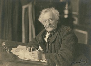Félix Nadar am Schreibtisch sitzend von Paul Nadar