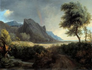 Gebirgige Landschaft, vom Meer umspült. Regenbogen