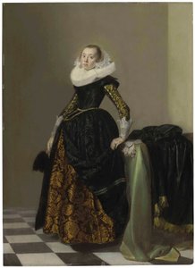 Porträt einer reich gekleideten jungen Dame, ganzfigurig, vor einem drapierten Tisch von Pieter Codde