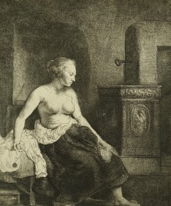 Eine halb angezogene Frau sitzt neben einem Ofen, 1658 von Rembrandt van Rijn