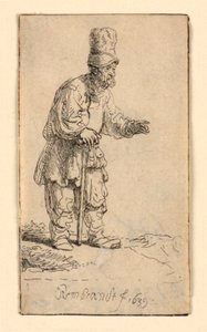 Ein Bauer mit hoher Mütze, stehend und auf einen Stock gelehnt