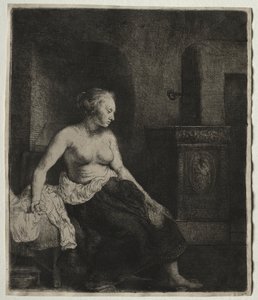 Frau sitzt halb angezogen neben einem Ofen von Rembrandt van Rijn