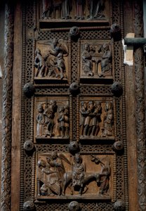 Romanische Kunst: Holztür aus der Mitte des 12. Jahrhunderts der Kirche St. Maria im Kapitol in Köln, Deutschland (Sankt Maria im Kapitol, Köln). Szenen, die die Verkündigung an die Hirten, die Geburt, die Anbetung der Weisen und die Flucht nach Ägypten da