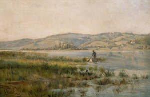 Paddelnder Mann auf dem See