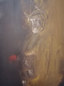 Nachdenkliche Figur mit Rotem Apfel