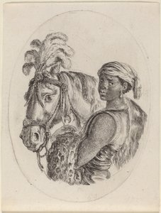 Schwarzer Stallbursche mit einem arabischen Pferd
