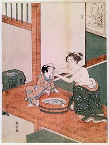 Eine nackte Mutter wäscht ihr Kind in Japan neben einem mit Wasser gefüllten Becken. Drucke von Haronobu Suzuki (1725-1770). 1766-1768. Paris, Guimet Museum, Nationalmuseum für asiatische Kunst