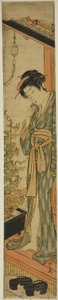 Frau bewundert Morgenblumen beim Zähneputzen von Torii Kiyonaga