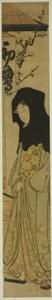 Frau mit schwarzer Kapuze vor dem Hatsutaka-Teesalon