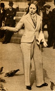 Eine beknöpfte Dame füttert Tauben auf dem Trafalgar Square, 1933