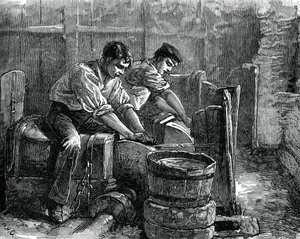 Schleifer bei der Arbeit an einem Rad, ca. 1880