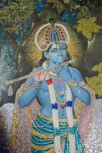 Hinduismus; Gemälde von Lord Krishna mit Flöte; Durgiana Mandir Vishnu Tempel; Amritsar; Punjab; Indien; Südasien; Asien
