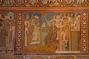 Kaiser Konstantin überreicht Papst Silvester seine kaiserliche Tiara und gibt ihm die Herrschaft über Rom, Westwand der Kapelle San Silvestro, 1246