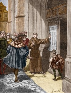 Martin Luther (1483-1546) hängt seine 95 Thesen in Wittenberg an