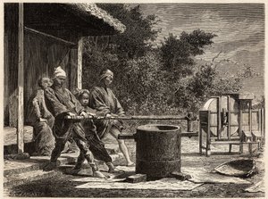 Drei Bauern betreiben die Reismühle. Gravur zur Illustration der Reise nach Japan in den Jahren 1863-1864, von Aime Humbert, Minister der Schweizerischen Eidgenossenschaft, in „Le tour du monde, nouveau journal des voyages“, veröffentlicht unter der Leitun