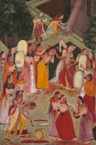 Mädchen besprühen sich gegenseitig an Holi