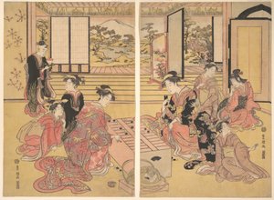 Zwei junge Frauen spielen ein Spiel von Sugoroku