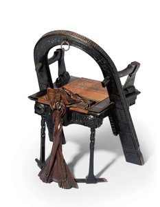 Geschnitzter Trompe-l