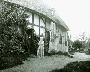 Personen an der Tür eines Cottages von Frederick (attr. to) Barnard