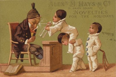 Drei kleine Jungen spritzen Wasser von American School